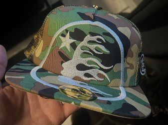 Hellstar Camo Print Trucker Hat (Green Camo With Large Hellstar Logo)