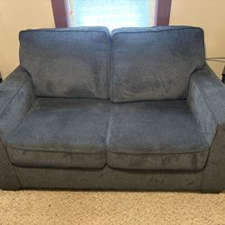 Ashley Furniture Loveseat (less than a year old, still under warranty)