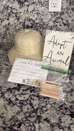Free - left over Adopt an animal sign, certificate, pencils and safari hats