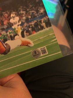Travis ettienne signed and Beckett certified 8 x 10