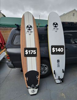 2 Gerry Lopez 8ft Foam Surfboards,  good condition,  1 is $175, the other is $140, leashes included