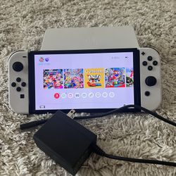 nintendo switch oled with 2 games downloaded 