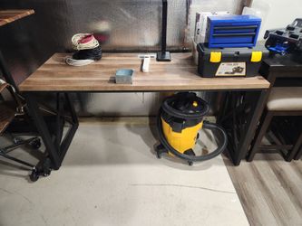 Nice desk with access panel In middle.