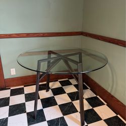 Glass Table and Black Chairs