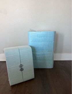 300 Amazon Basics Puppy Pads (3 Packs x 100)