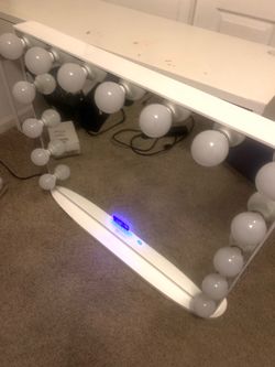 Makeup table and makeup light