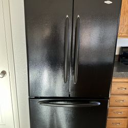 Black Maytag Refrigerator and Stove 