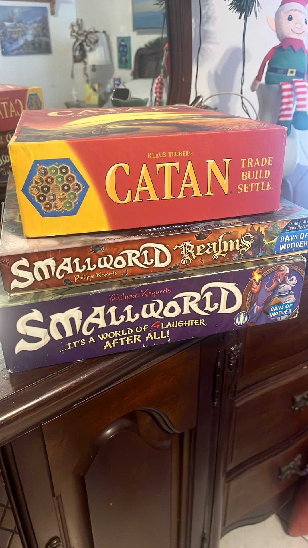 Catan And Small world Board Games