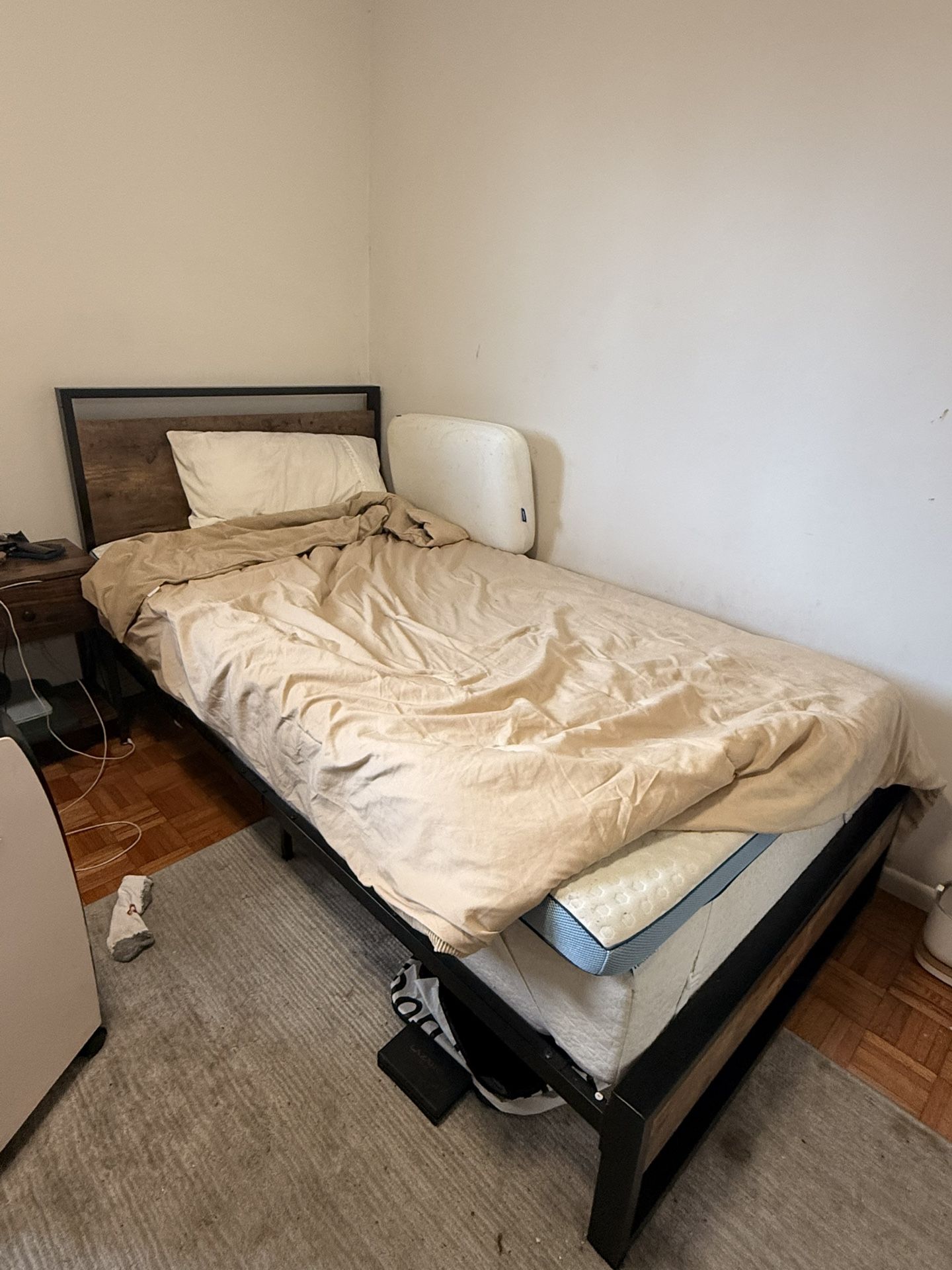 twin XL bed. INCLUDES mattress AND mattress topper. 
