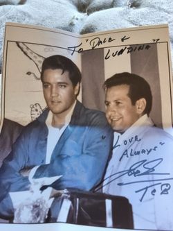 I have a signed authentic picture of Elvis bestfrtiend Joe Esposito