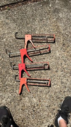 Caulk guns