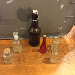 Assorted vintage bottles and jars