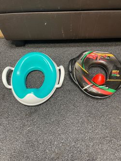 Potty Training Seat – Padded | World Grand Prix Cars Theme   Potty training seat in great condition, featuring a fun World Grand Prix Cars theme — per