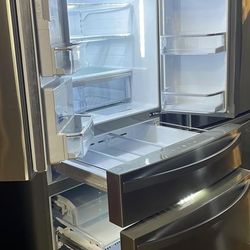 36 inch kenmore elite refrigerator in good condition with 4 months warranty