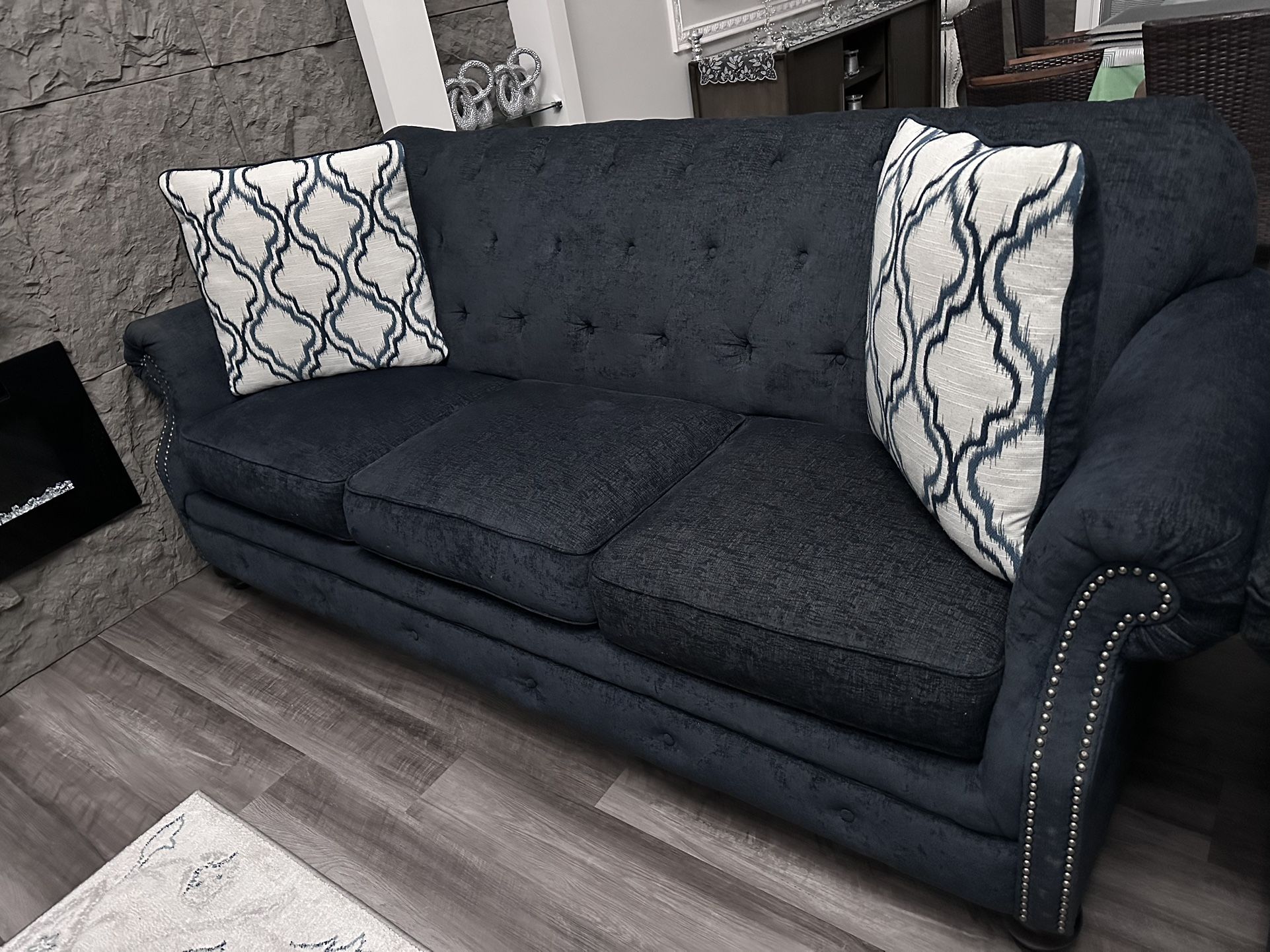 One Small Couch, One Big Couch