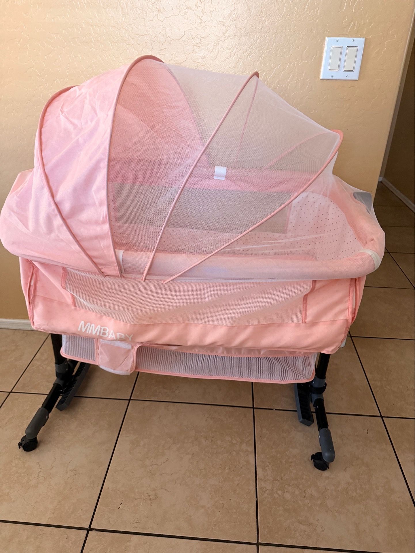 Pink baby bed