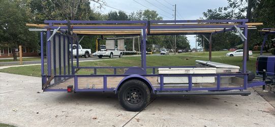 Purple 14x6.5 utility trailer with ladder rack