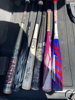 Six baseball bats $50