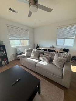 Light Gray Fabric Sofa with Throw Pillows