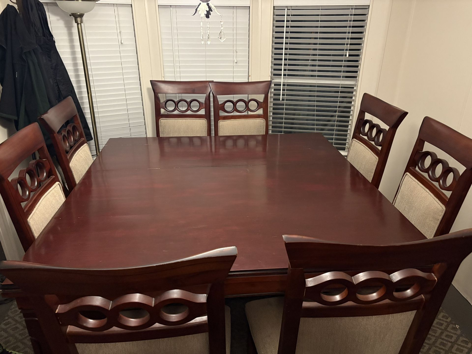 Dining Table 8 Cushy Chairs.