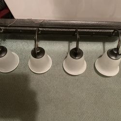 Bathroom Vanity Light With 4 Lights, Black With Touch Of Gold, Frosted Shades, 32 X 10 X 8.75”