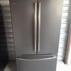GE Stainless Steel Refrigerator And Freezer