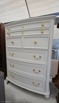 White dresser with gold or silver handles