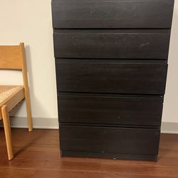 vertical dresser with 5 drawers.