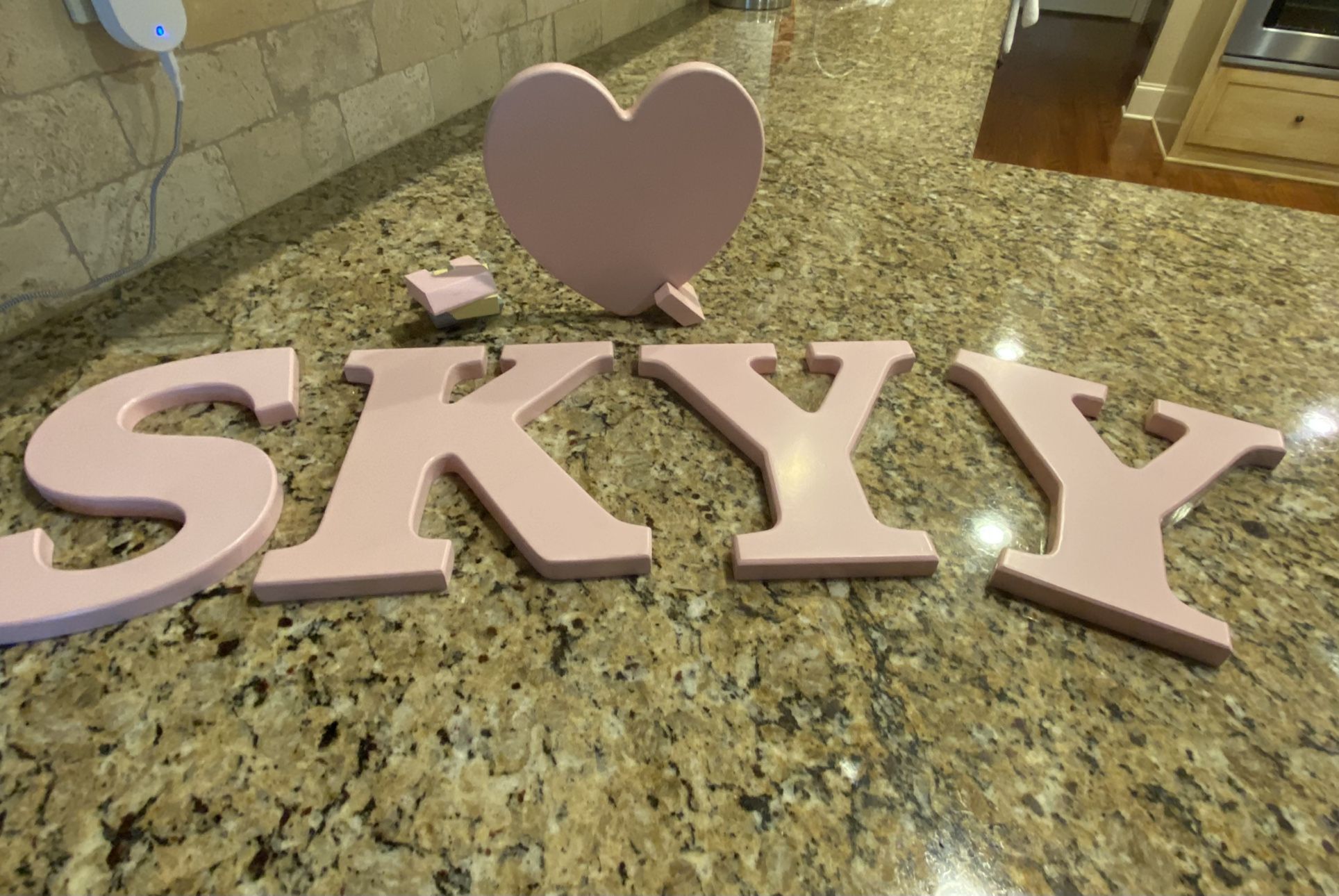 Wood Pink Letters w/Heart (Name SKYY or SKY). They can be hung up on wall. 8”L x 8”W