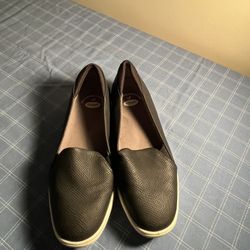 Comfortable black slip-on shoes by Dr. Scholl's. Size 7