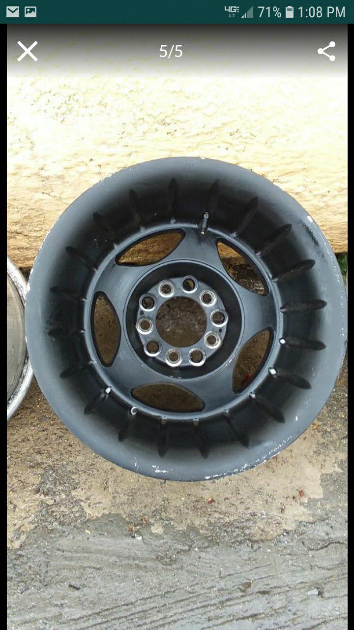 BLACK RIMS SIZE 15".UNIVERSAL 10 HOLE FITS CHEVY / FORD/CHEROKEE NO DENTS AND NO BENDS.5 LUGS