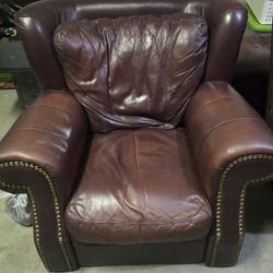 Burgundy Leather Furniture & Marble Tables