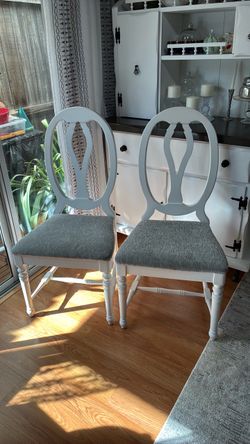 2 wooden chairs