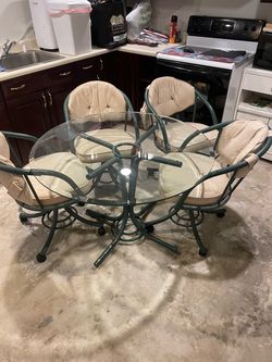 42” Round glass table with 4 chairs