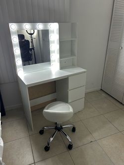 Vanity with chair and organizer boxes
