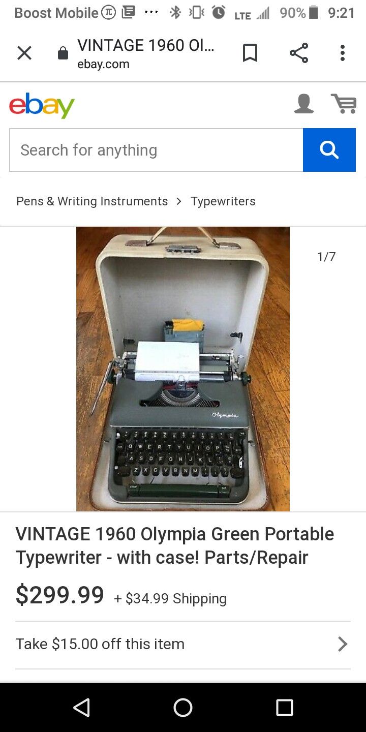 Vintage olymia typewriter with built in case