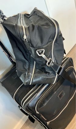 Tumi Black Nylon roller bag