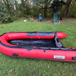 14-inch inflatable boat with a 2-stroke Yamaha 8-hp engine
