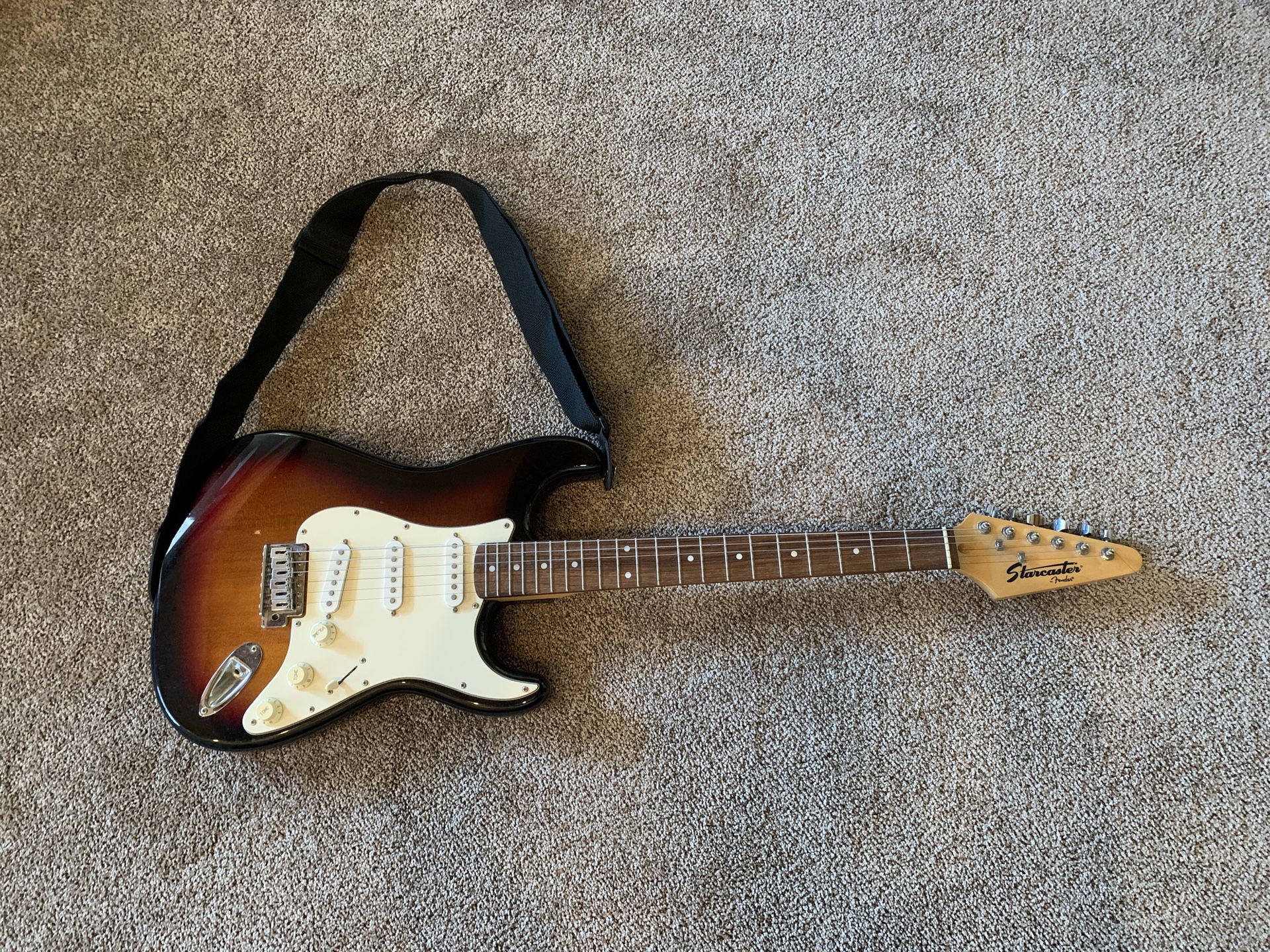 Fender guitar, case, and amp
