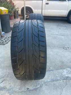Staggered 20s rims on Nitto