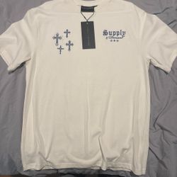 White shirt with cross design