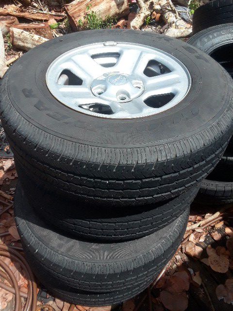4 Goodyear tires with rims