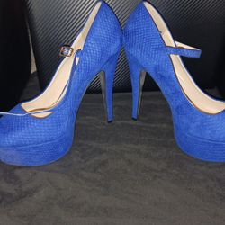 Blue Stiletto Heels With Straps And A Platform