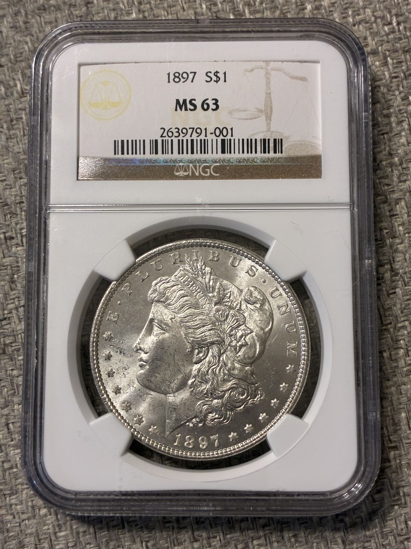 1897 Morgan Dollar. NGC MS63 !