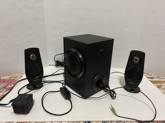 The Creative Inspire T3030 is a 2.1-channel wired speaker system