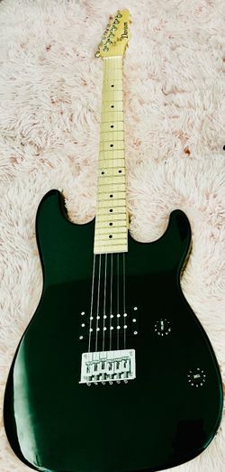 Electric guitar with speaker