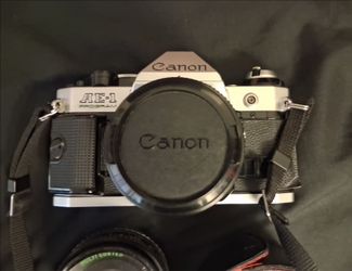 CANON AE-1 PROGRAM IN EXCELLENT CONDITION WITH VARIOUS LENSES. ASKING $320 OBO