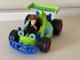 The Fisher-Price Shake 'n Go! Disney Pixar Toy Story 3 Talking Woody & RC Car