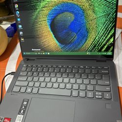 TOUCH SCREEN  LENOVO GAMING   Laptop with AMD Ryzen 7 5700U Processor and Radeon Graphics is a powerful and sleek gaming machine suitable for high-res