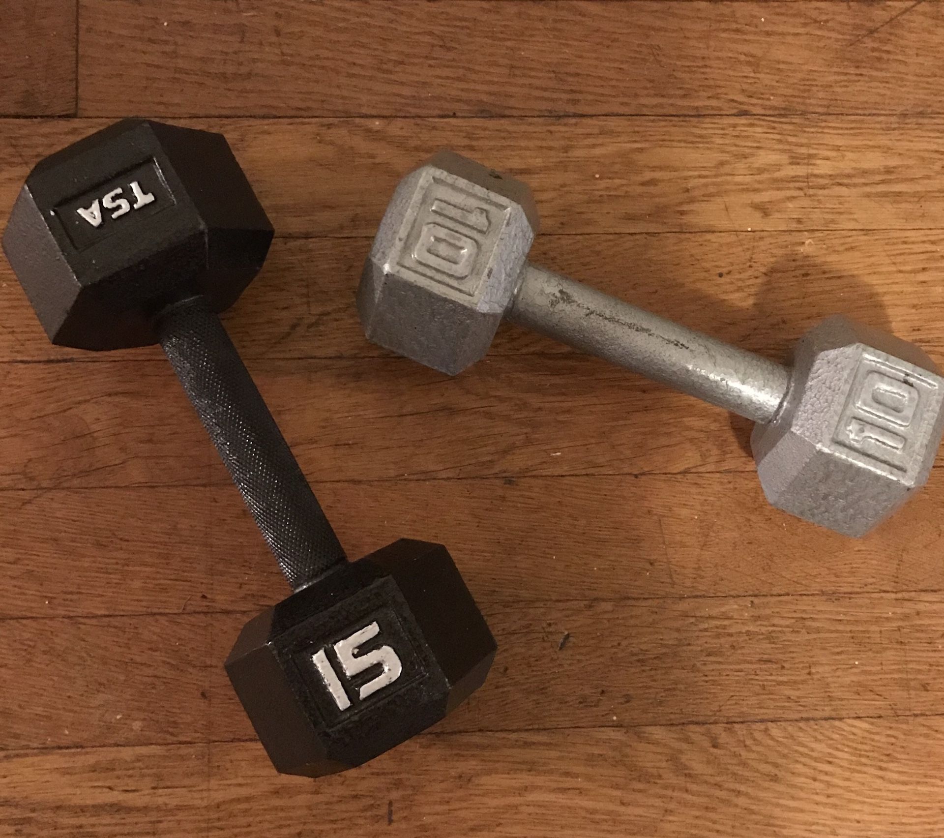 10 and 15 pound dumbbells